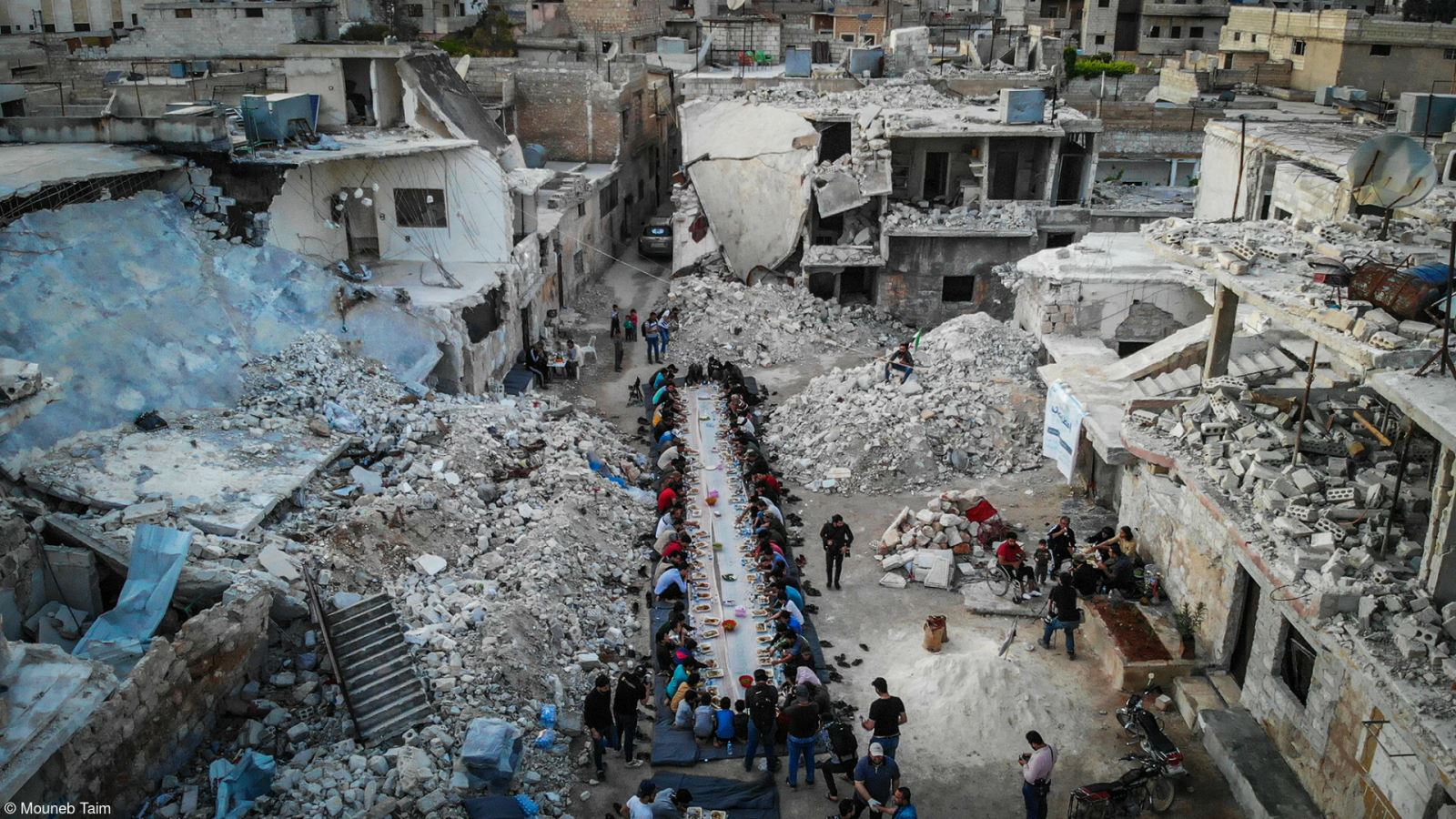 ‘Ramadan Meals Among the Ruins in Idlib, Syria’ by Syrian photographer, Mouneb Taim, won the Politics of Food category. The image captures a group holding breakfast during Ramadan amongst the rubble left after the Syrian regime’s campaign on Idlib.